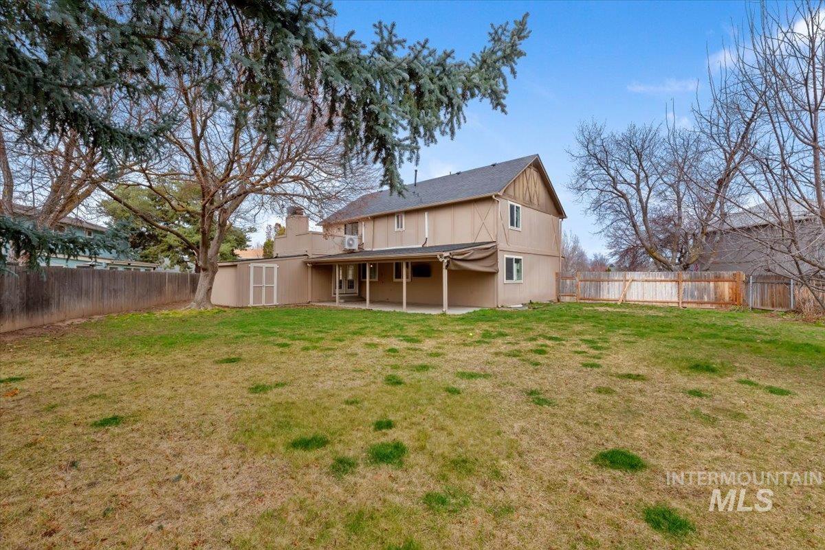 4297 Nystrom Way Boise, ID 83713 - Photo 39 of 50 Rear view of house with a patio area and a fenced backyard