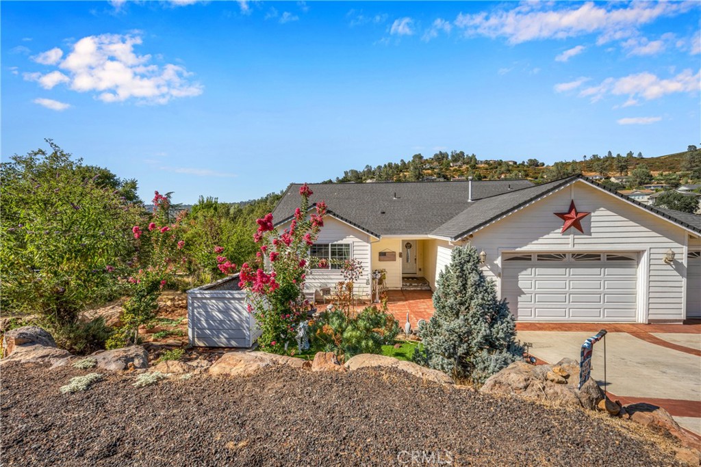 17503 Deer Hill Road Hidden Valley Lake, CA 95467 - Photo 1 of 32 a front view of a house with a yard