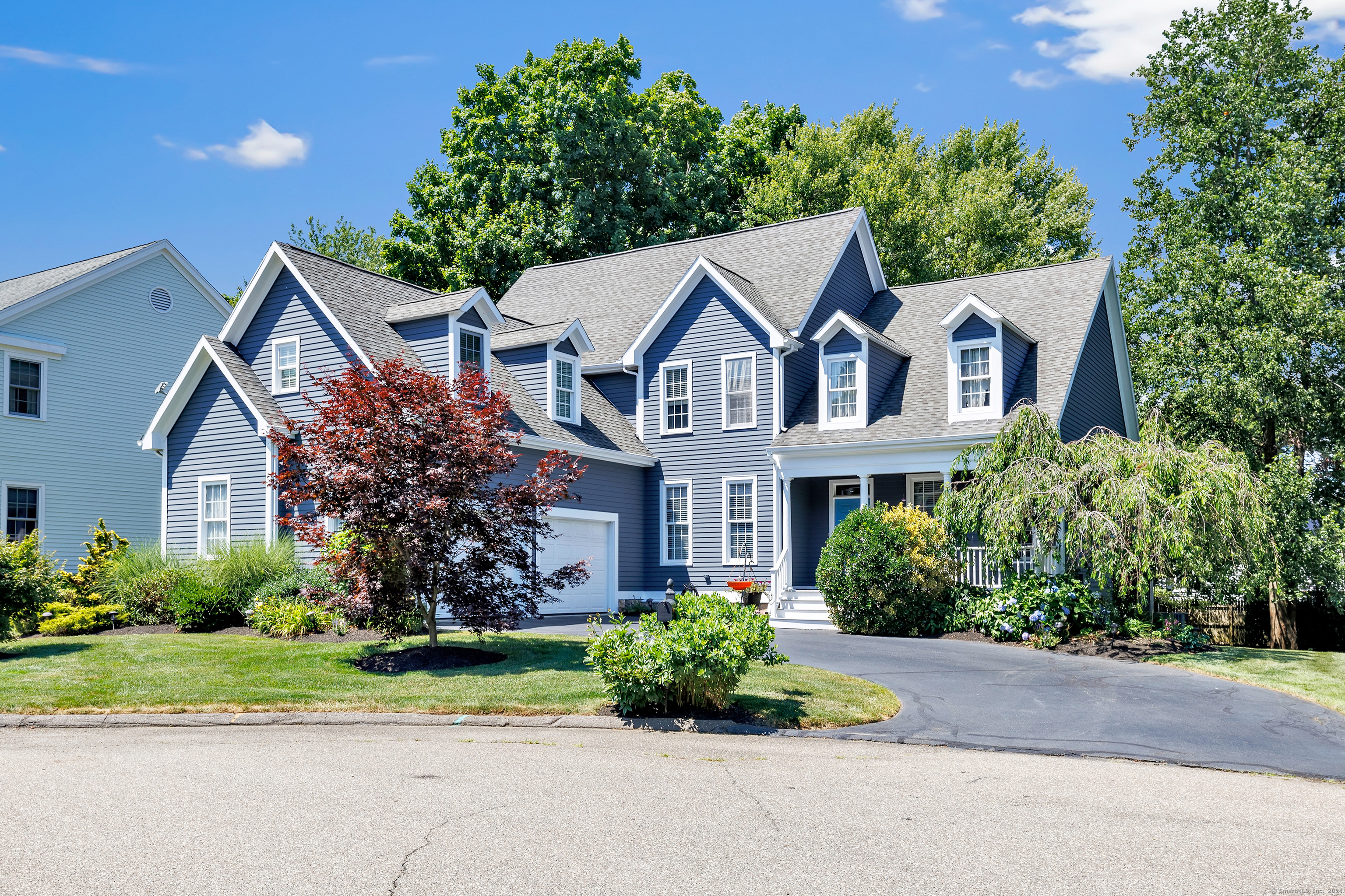 62 Hitching Post Lane Milford, CT 06460 - Photo 1 of 1 front view of a house with a small yard