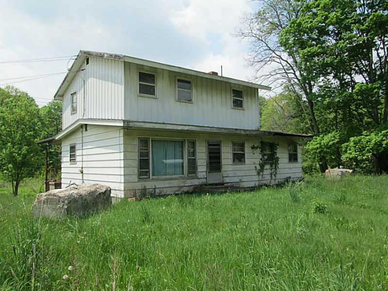 Exterior Front. Three bedroom ranch home with second floor additional 3 bedrooms and a bathroom need finished.