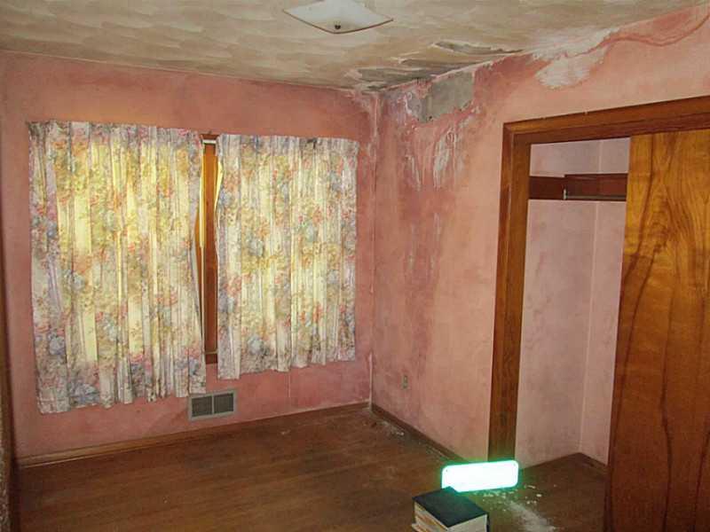 1112 Upper Mateer Road Vandergrift, PA 15690 - Photo 13 of 21 Bedroom. Water damage from roof leak.