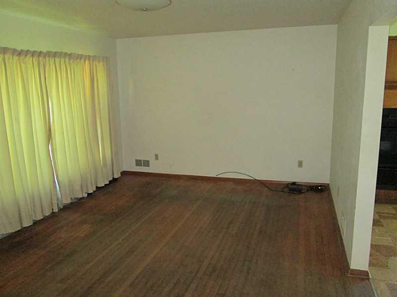 1112 Upper Mateer Road Vandergrift, PA 15690 - Photo 14 of 21 Living Room. Hardwood floors