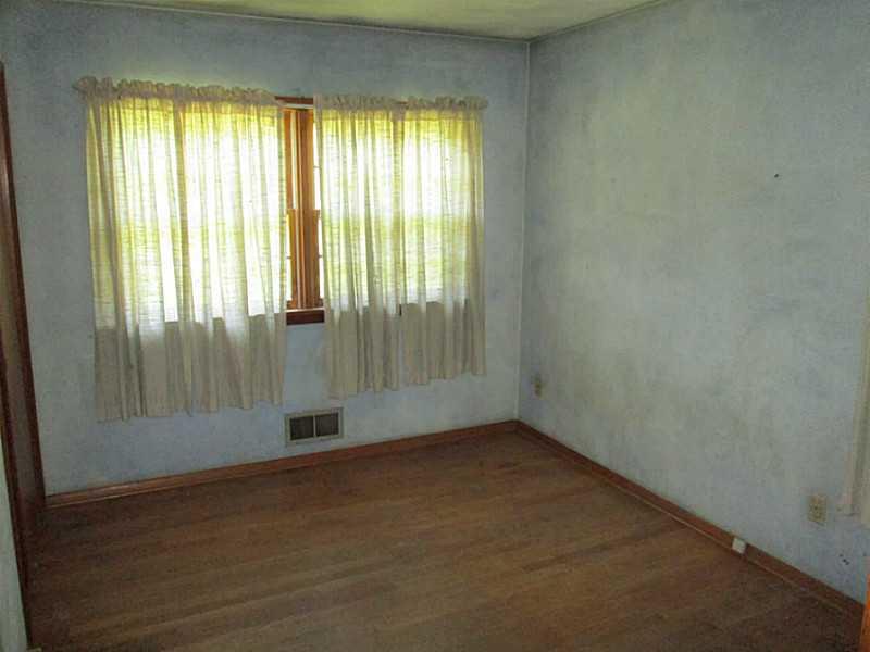 1112 Upper Mateer Road Vandergrift, PA 15690 - Photo 9 of 21 Bedroom. Hardwood throughout the first floor.