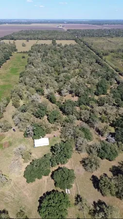 a view of a yard with an outdoor space