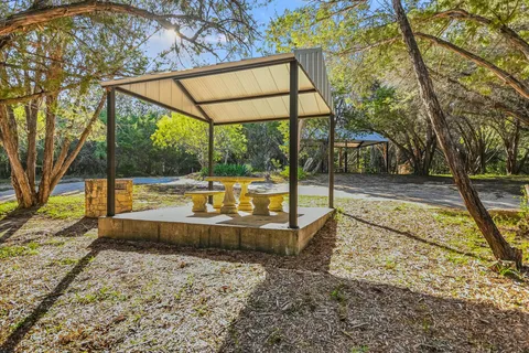 a view of swimming pool with a backyard