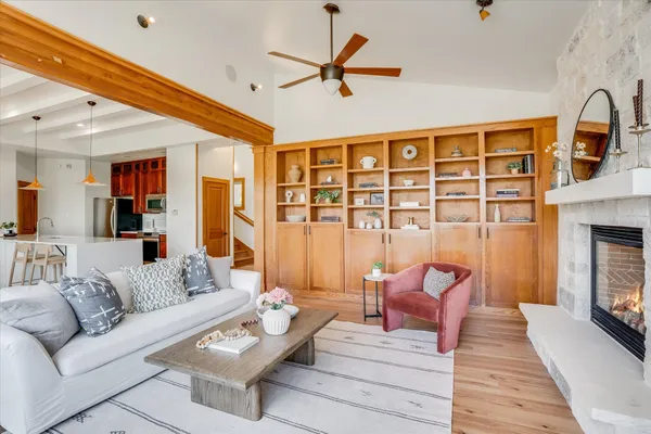 a living room with furniture a fireplace
