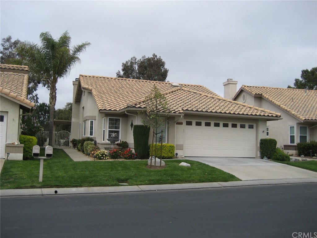 939 Pauma Valley Road Banning, CA 92220 - Photo 1 of 1 a front view of a house with garden