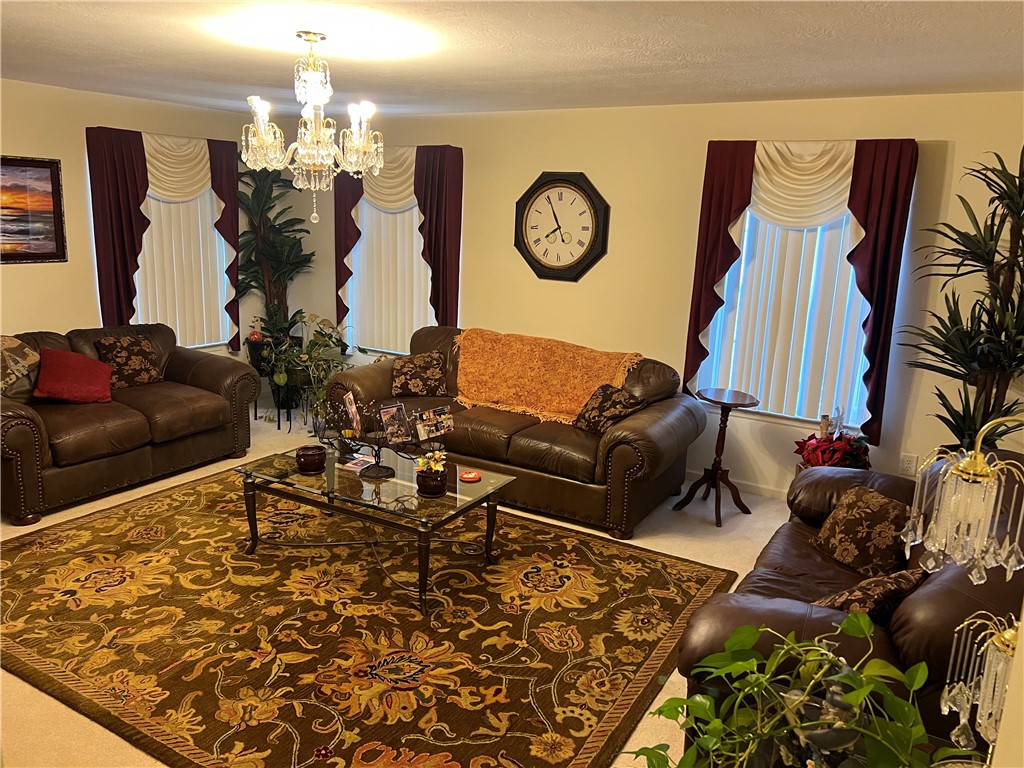 521 Calhoun Shores Parkway Calhoun Falls, SC 29628 - Photo 17 of 39 This living room offers comfort and style, perfect for relaxation and gatherings.