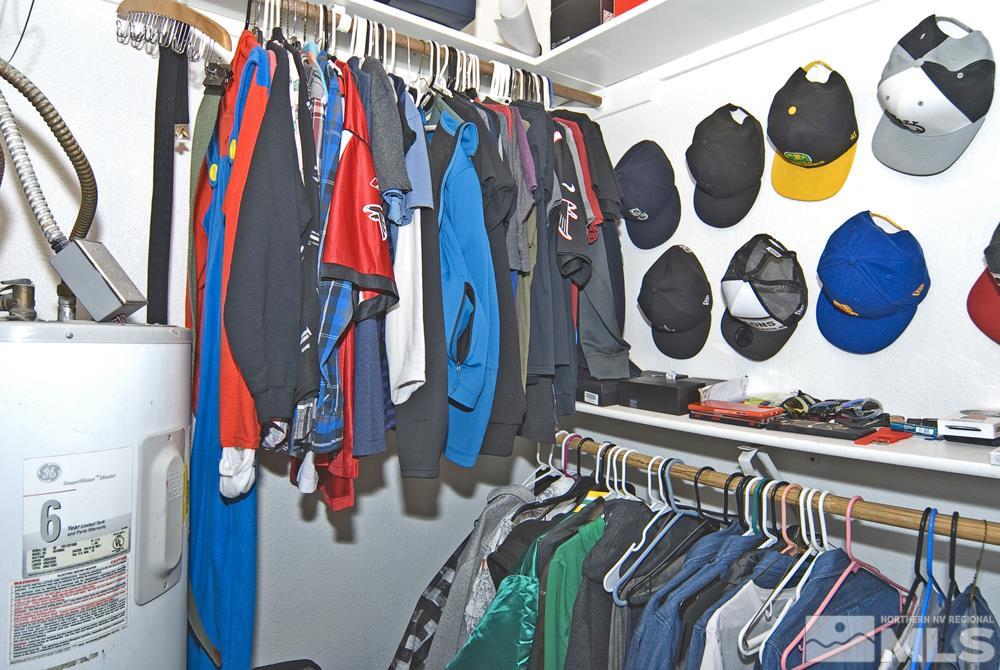 2095 Highview Court, Unit 7 Reno, NV 89512 - Photo 17 of 24 a view of walk in closet with clothes and shoes