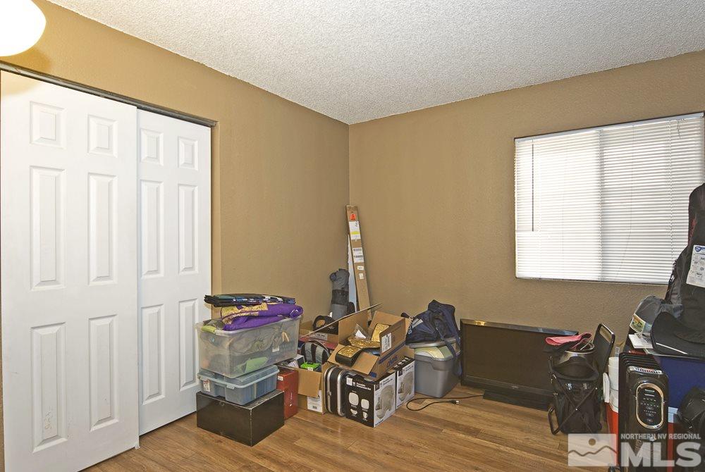 2095 Highview Court, Unit 7 Reno, NV 89512 - Photo 19 of 24 a view of a workspace with furniture and a window