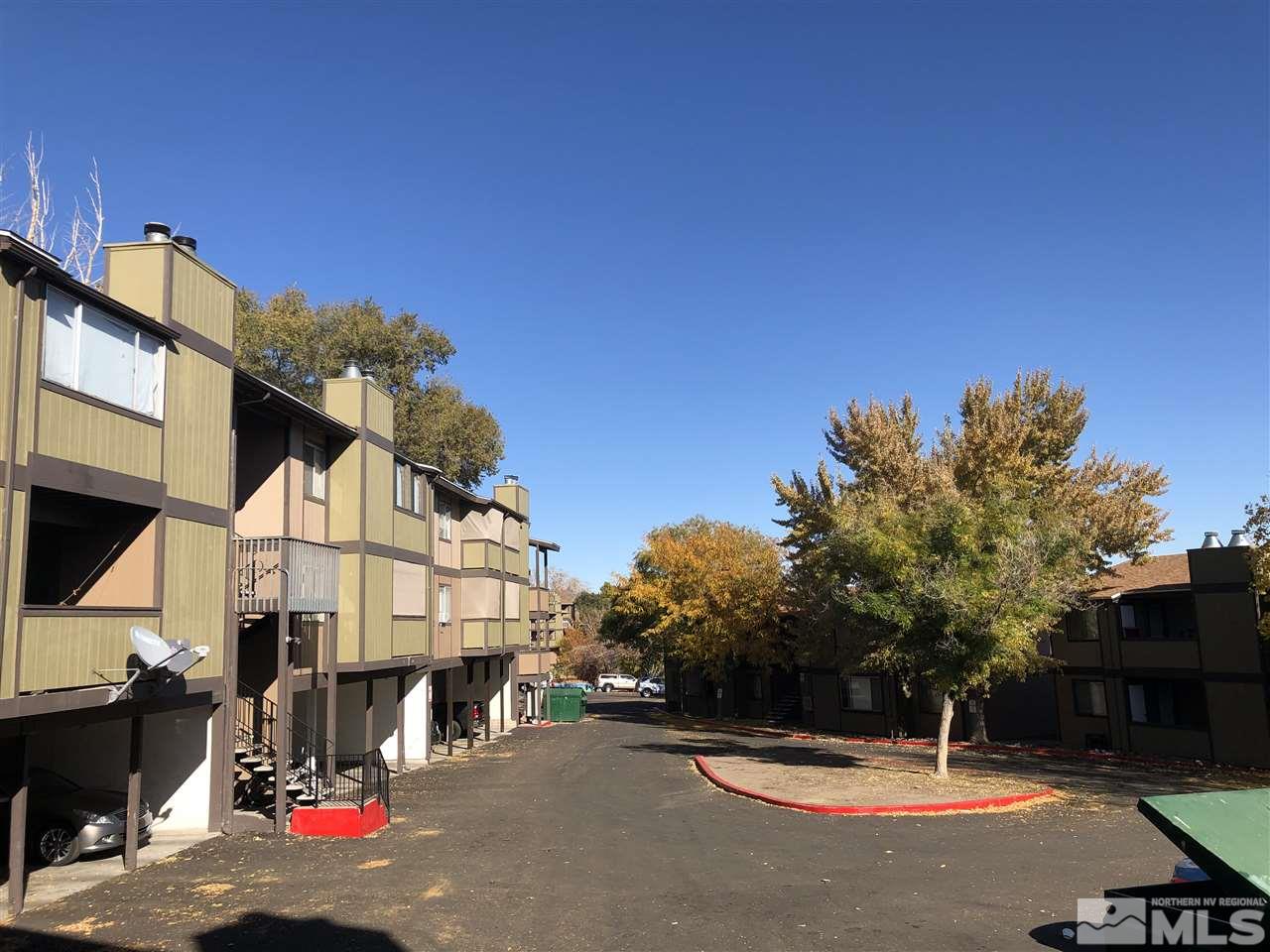 2095 Highview Court, Unit 7 Reno, NV 89512 - Photo 3 of 24 a view of a street with cars