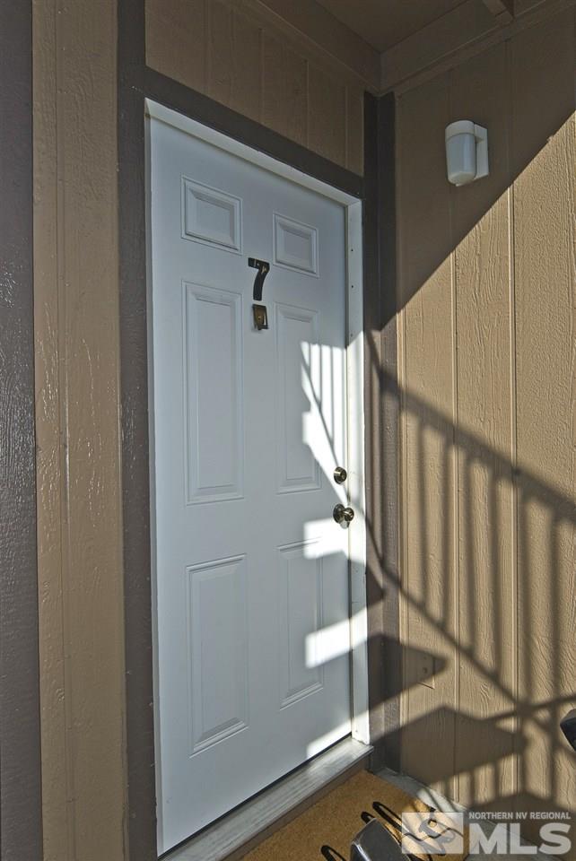2095 Highview Court, Unit 7 Reno, NV 89512 - Photo 4 of 24 a view of entryway with wooden floor
