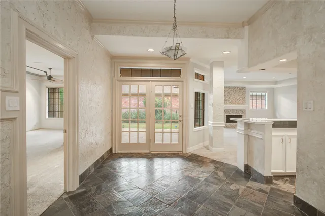 a kitchen with a sink stove and refrigerator