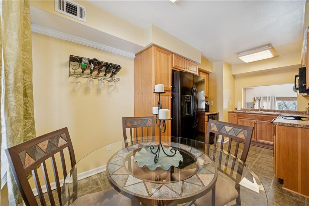 117 Community Court Pittsburgh, PA 15205 - Photo 14 of 34 a living room with furniture and a dining table