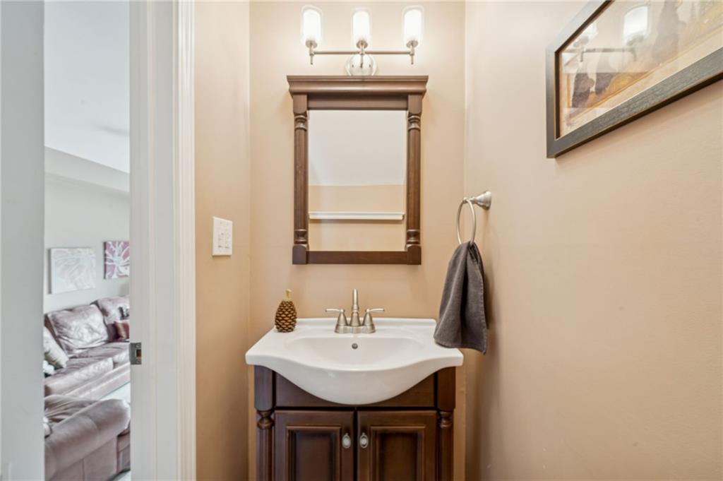 117 Community Court Pittsburgh, PA 15205 - Photo 15 of 34 a bathroom with a sink and a mirror