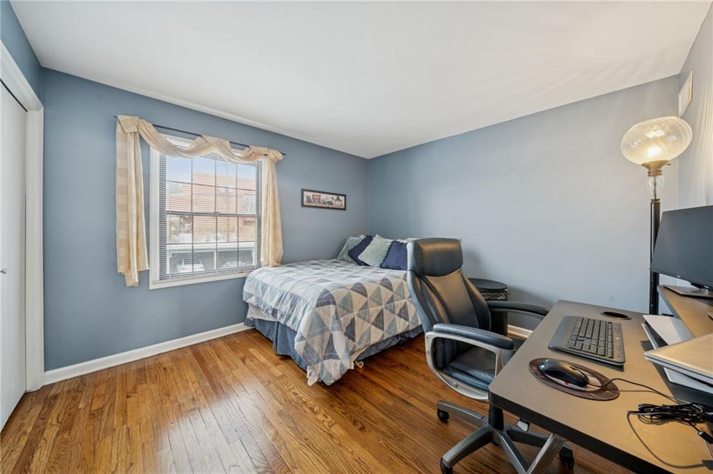 117 Community Court Pittsburgh, PA 15205 - Photo 21 of 34 a bedroom with a bed and a window