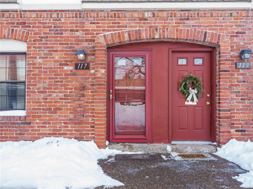 117 Community Court Pittsburgh, PA 15205 - Photo 30 of 34 a front view of a building with red door