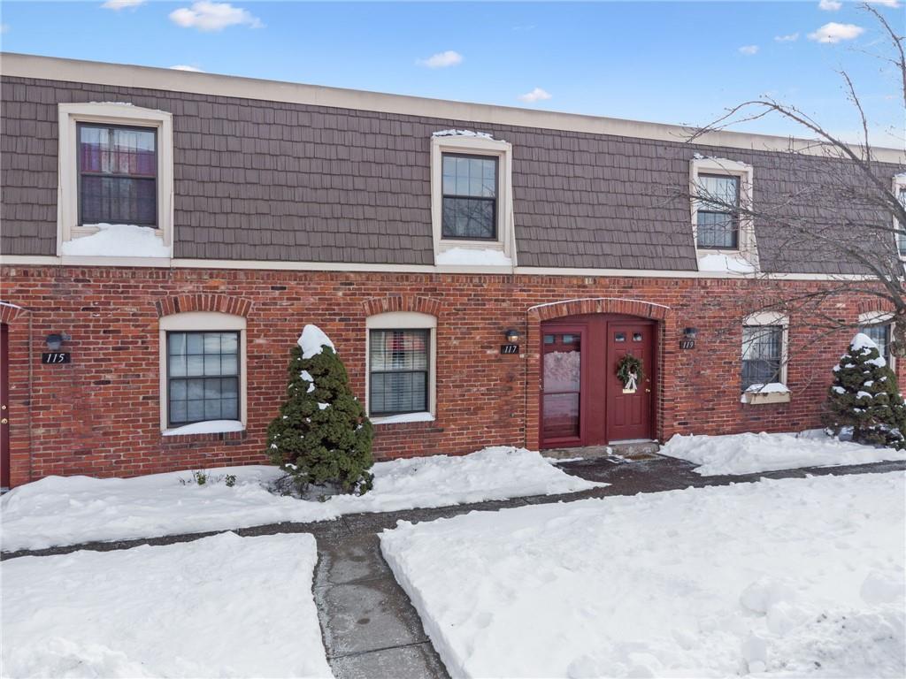 117 Community Court Pittsburgh, PA 15205 - Photo 31 of 34 front view of brick house with a yard