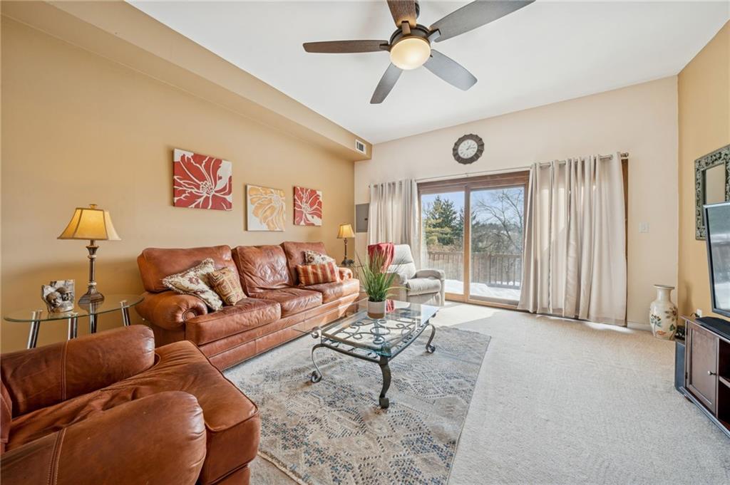 117 Community Court Pittsburgh, PA 15205 - Photo 4 of 34 a living room with furniture and a large window