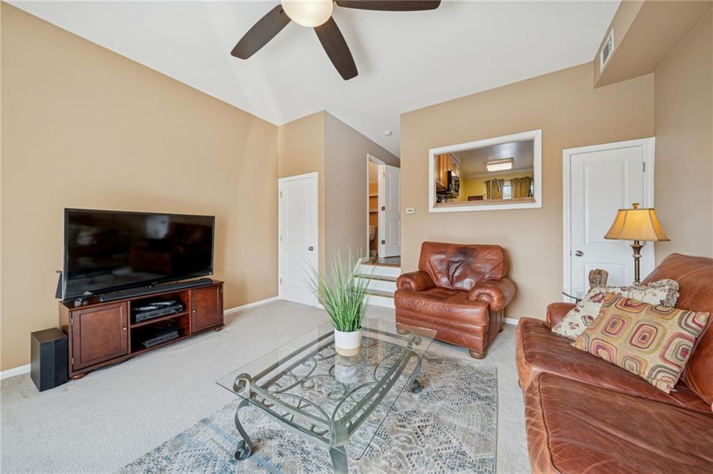 117 Community Court Pittsburgh, PA 15205 - Photo 6 of 34 a living room with furniture and a flat screen tv