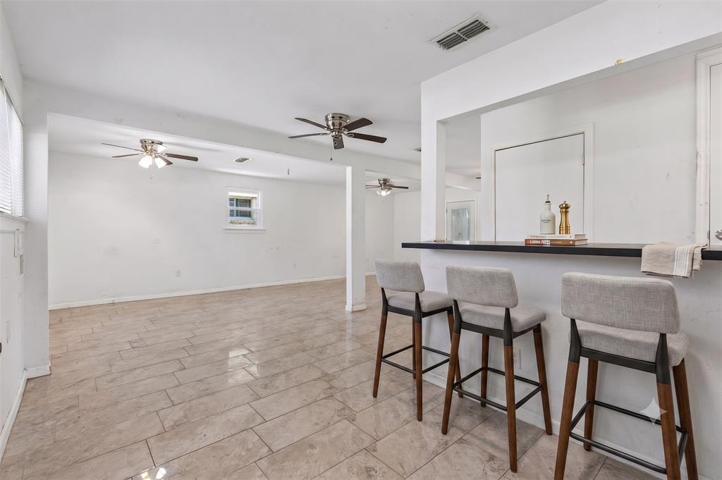 2013 Alan-A-Dale Road Arlington, TX 76013 - Photo 4 of 13 Kitchen Breakfast Bar - virtually staged