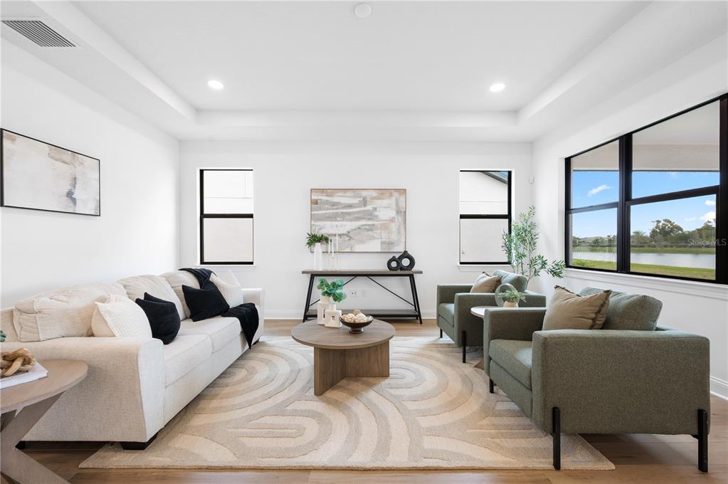 5856 Freestone Circle Apollo Beach, FL 33572 - Photo 12 of 33 a living room with furniture and a large window