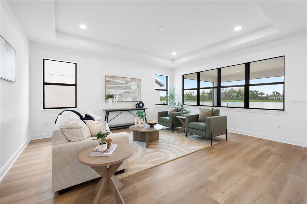 5856 Freestone Circle Apollo Beach, FL 33572 - Photo 14 of 33 a living room with furniture and a large window