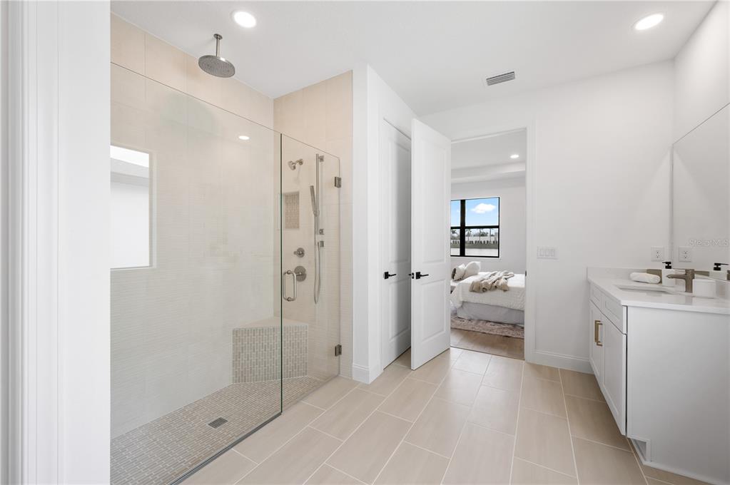5856 Freestone Circle Apollo Beach, FL 33572 - Photo 20 of 33 a bathroom with a tub sink and view of bathroom