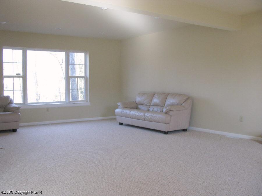 4 Pine Ridge Road East Stroudsburg, PA 18302 - Photo 3 of 12 2nd view of living room