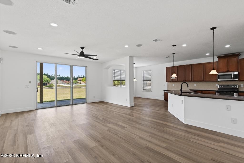 10917 Dancing Rabbit Lane Jacksonville, FL 32210 - Photo 5 of 121 Dancing Rabbit Living to Kitchen