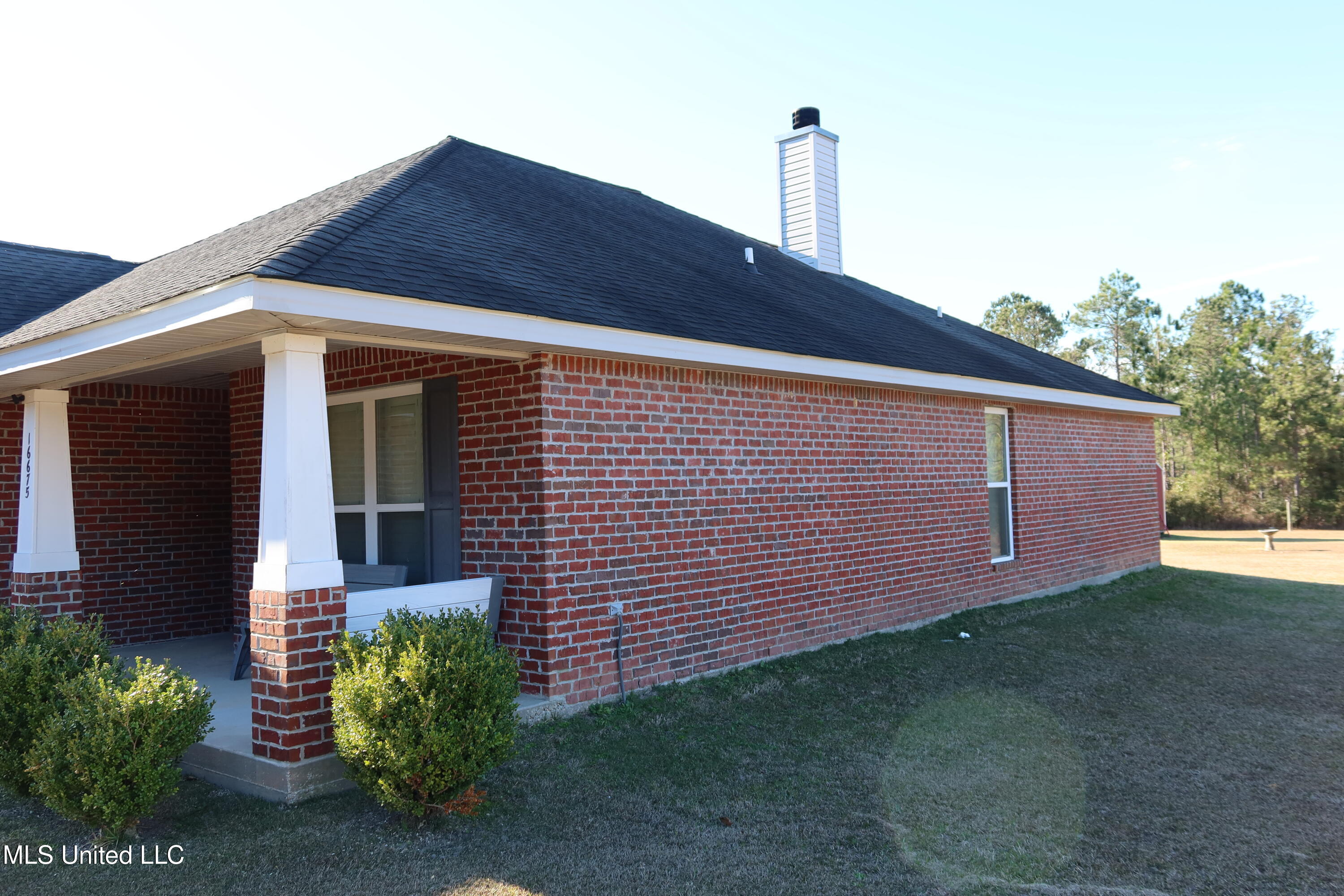 16675 John Smith Road Vancleave, MS 39565 - Photo 4 of 30 Side View of Home