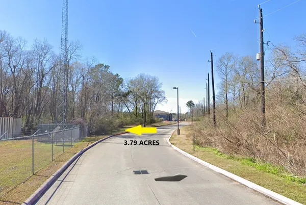 a view of a swimming pool with a patio and yard