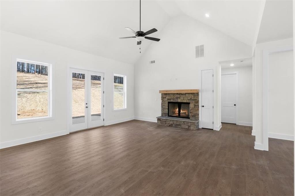7 Everwood Court Rome, GA 30161 - Photo 14 of 55 an empty room with windows and fireplace