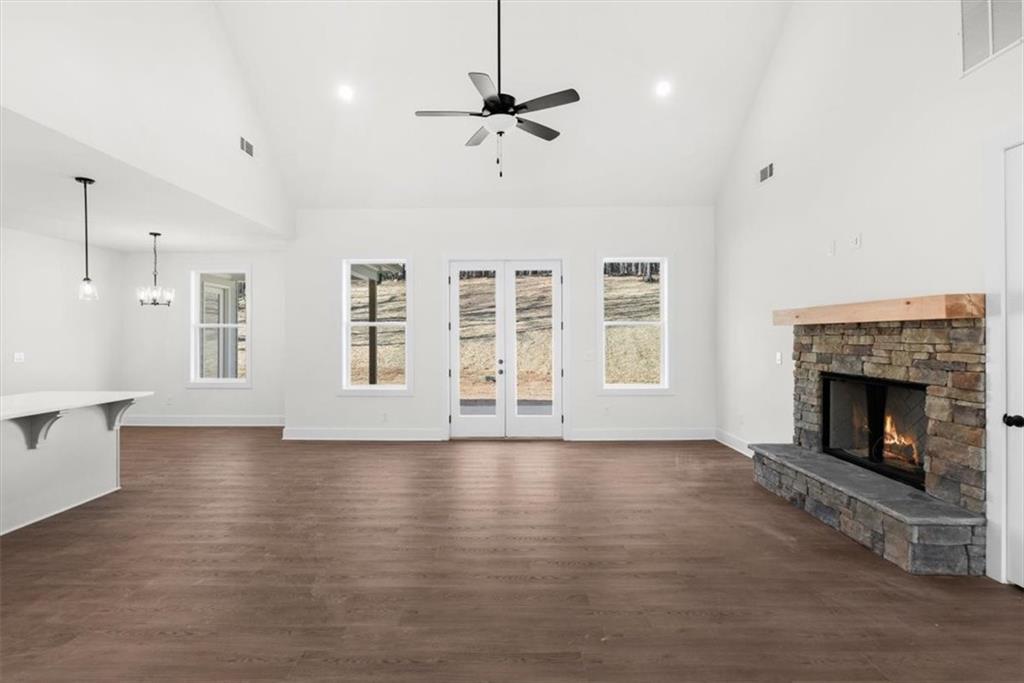 7 Everwood Court Rome, GA 30161 - Photo 15 of 55 a view of an empty room with a fireplace and a window