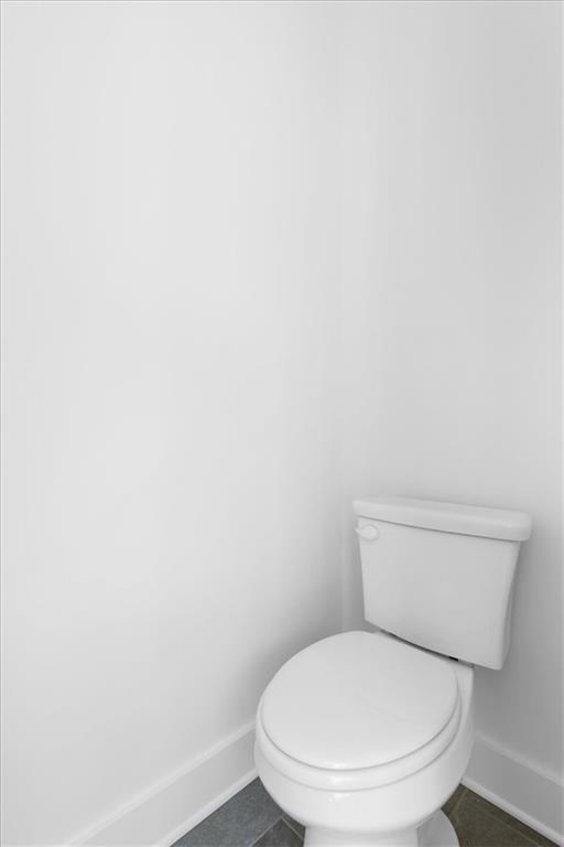 7 Everwood Court Rome, GA 30161 - Photo 35 of 55 a white toilet sitting next to a white wall