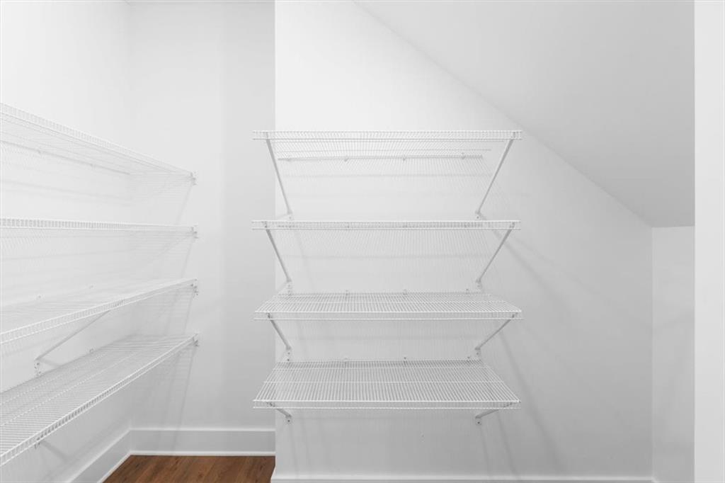 7 Everwood Court Rome, GA 30161 - Photo 39 of 55 a view of walk in closet with empty racks