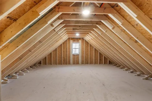 a view of road and snow on the roadside