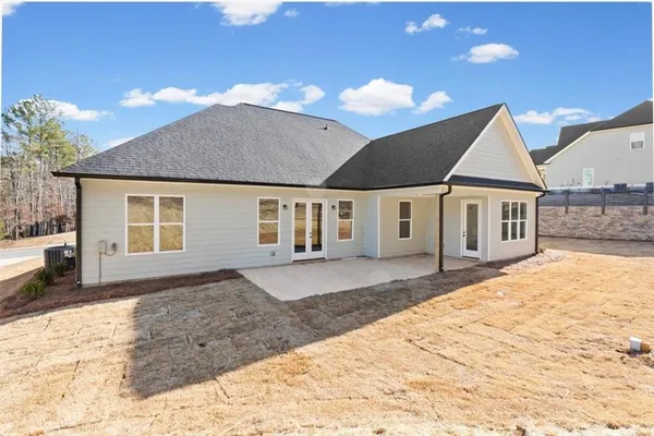 a view of a house with a snow in the background