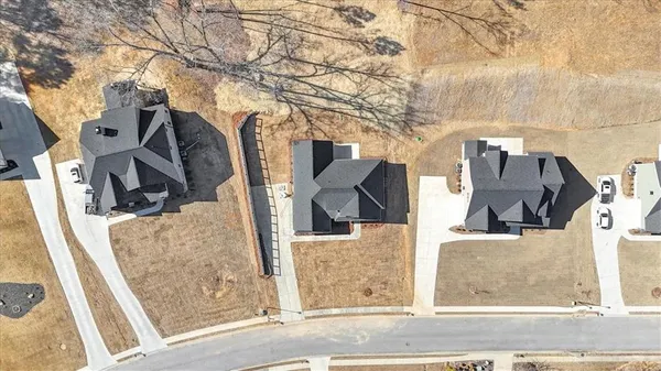 a picture of a room with a white wall and a clock