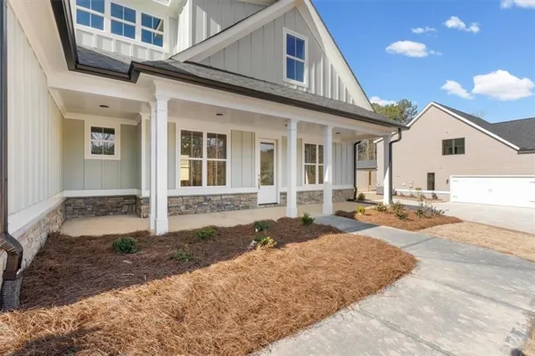a view of a house with a patio
