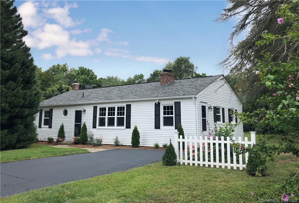 65 Pond Hill Road Wallingford, CT 06492 - Photo 1 of 1 a front view of a house with a garden