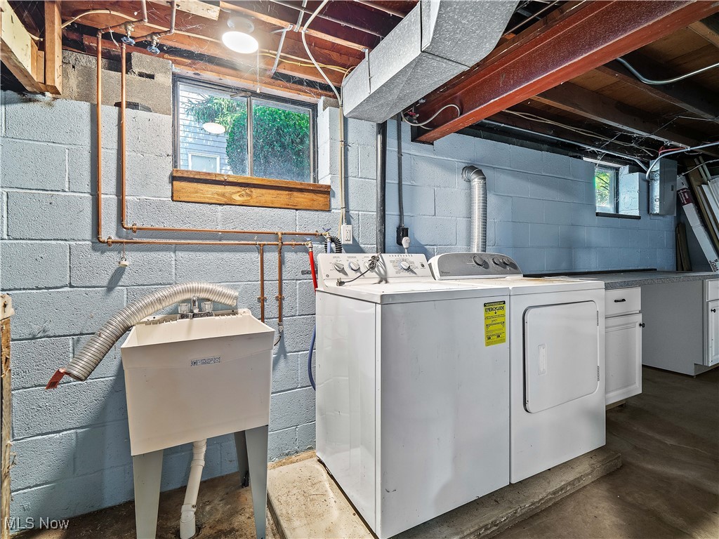110 Sprague Road Berea, OH 44017 - Photo 21 of 23 Washroom with washing machine and clothes dryer and healthy amount of natural light