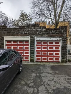 a front view of a house with a garage