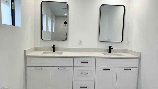 a view of a room that has a large window