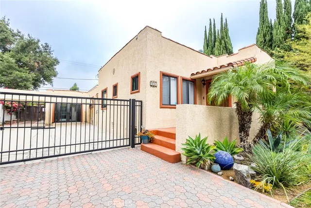 a house view with a garden space