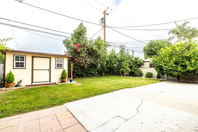 a house view with a garden space