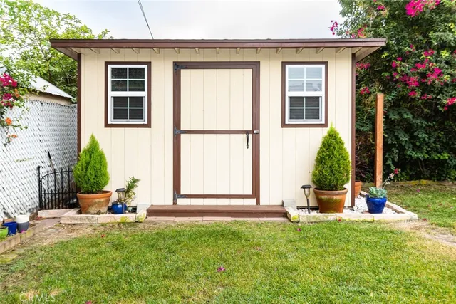a backyard of a house with seating space