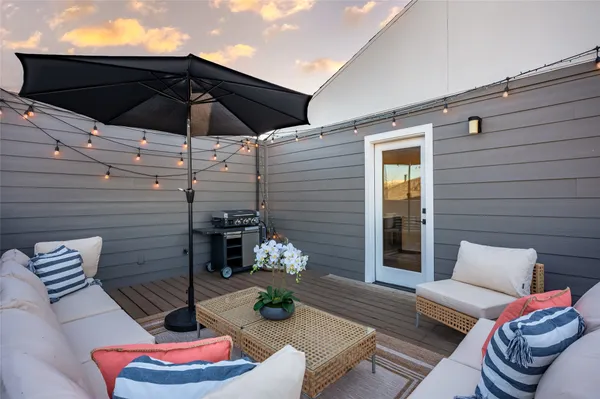 a backyard of a house with seating space