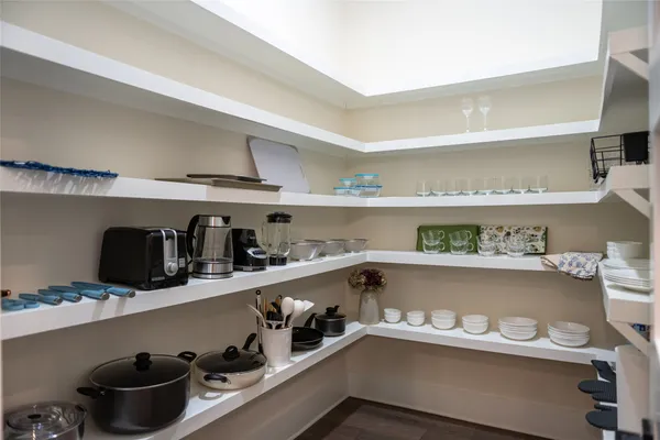 a kitchen with a stove and cabinets