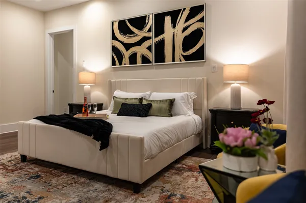 a bedroom with a bed and window